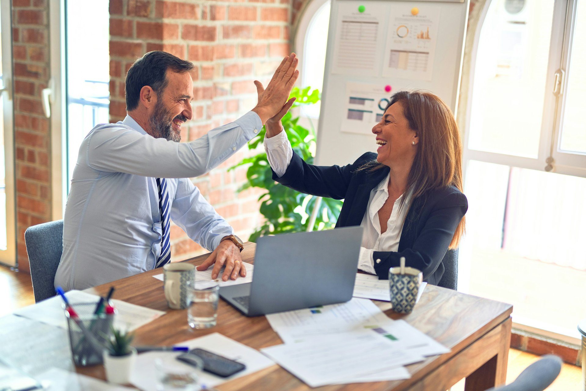 Accountants reviewing financial documents with a client